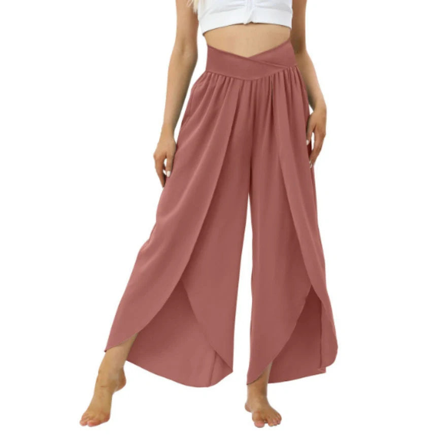 Versatile high-waist split-leg yoga trousers in a variety of colours, featuring a wide-leg silhouette and elasticated waistband for comfort and style.