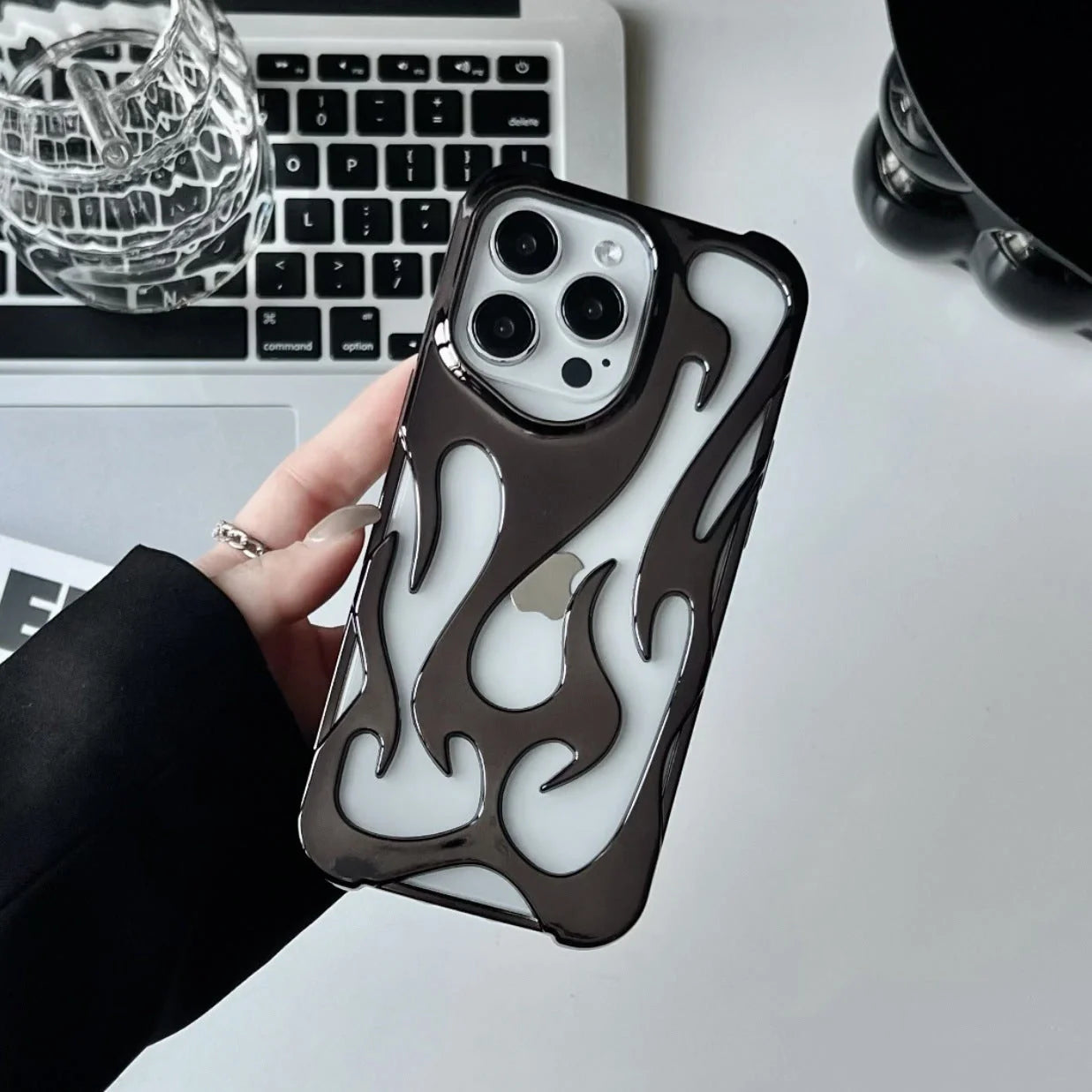 Premium electroplated iPhone case with hollow flame pattern for heat dissipation