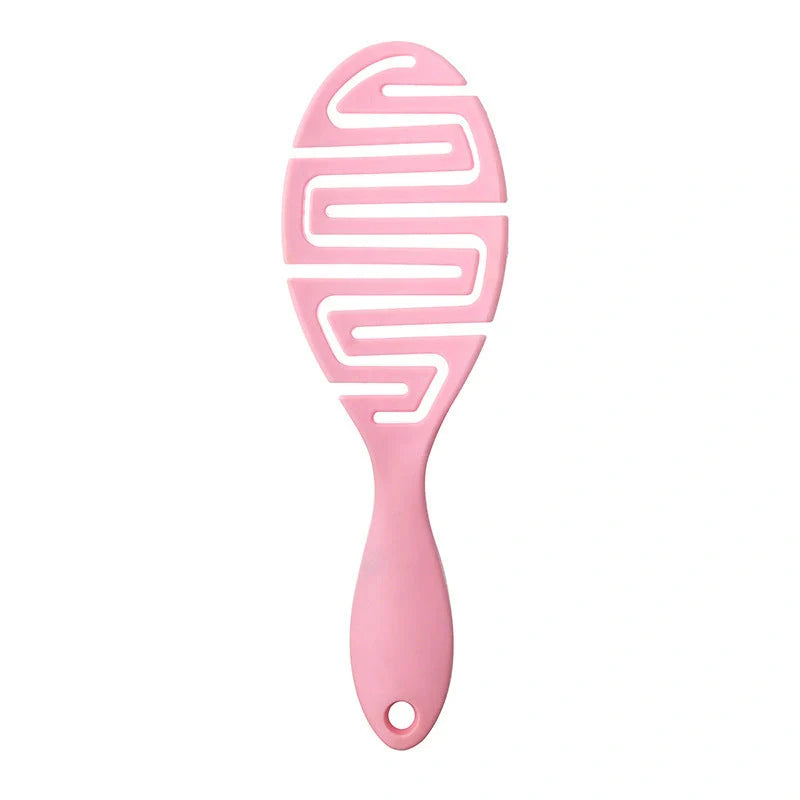 Stylish Massage Comb in various colours offering a soothing scalp massage and modern, minimalist design