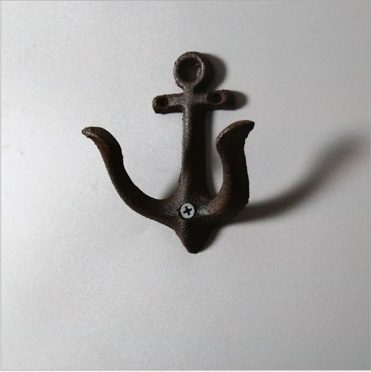 Industrial-style wrought iron wall hook with multiple rows for hanging coats and bags