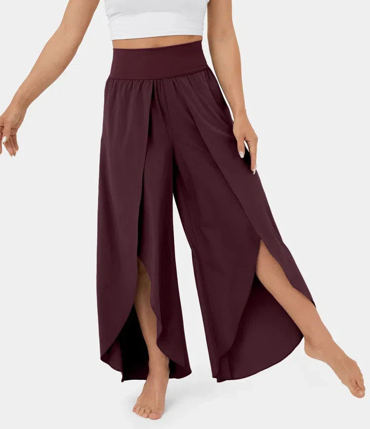 Versatile high-waist split-leg yoga trousers in a variety of colours, featuring a wide-leg silhouette and elasticated waistband for comfort and style.