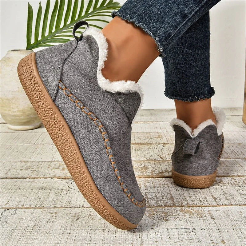 Stylish plush ankle boots with V-cut design, available in dark grey, black, light brown, and milky white colors