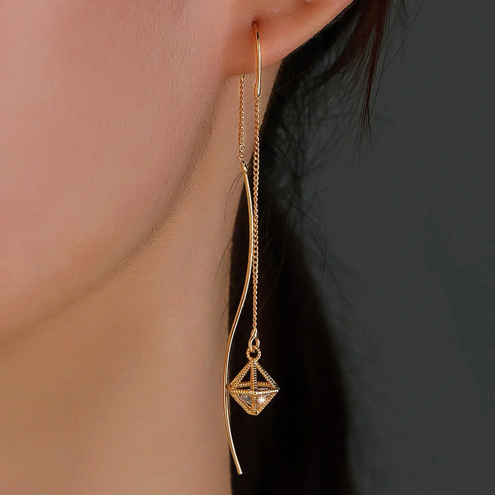 Gold Bronze Cutout Zircon Tassel Earrings with European and American Style