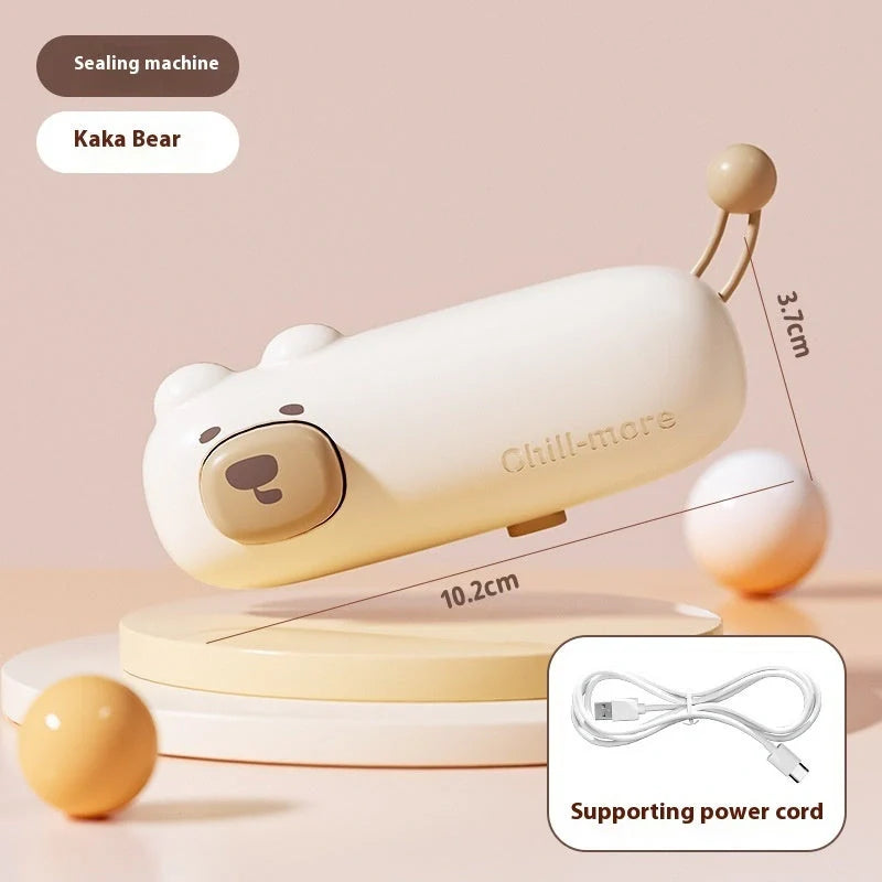 A compact, rechargeable bag sealer with a unique cartoon design, perfect for preserving food freshness at home or on the go.