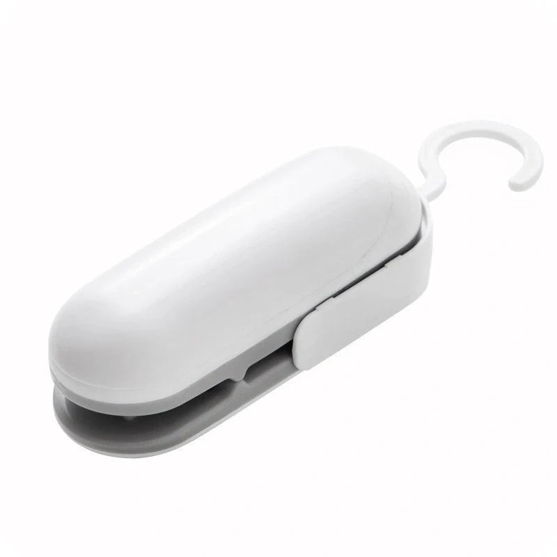 Mini Sealer Portable Heat Sealer in grey and brown for sealing snack bags and plastic packaging