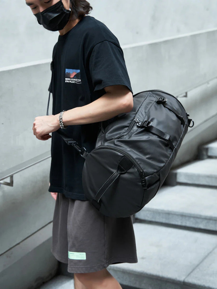 High-capacity travel backpack made from durable Oxford cloth with breathable, wear-resistant design and spacious 36-55 litre capacity
