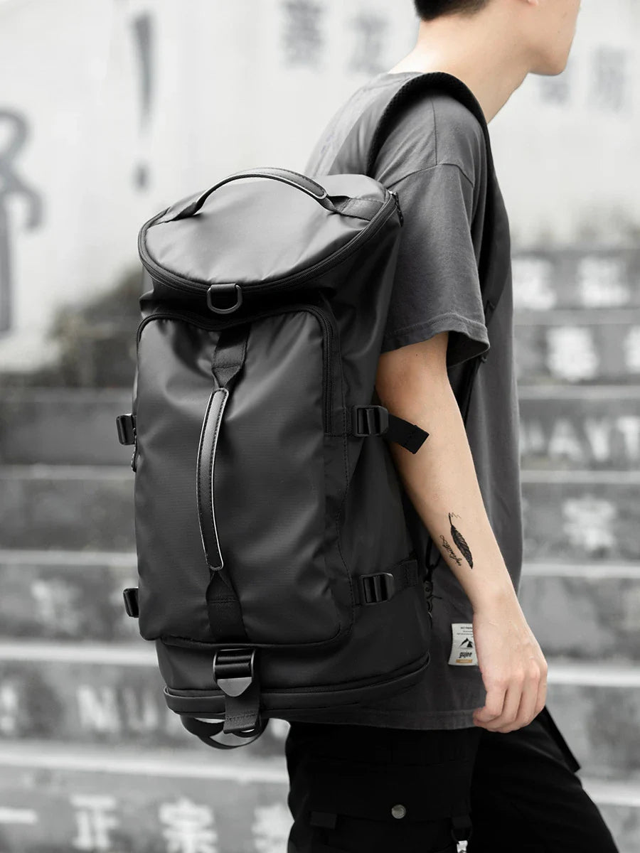 High-capacity travel backpack made from durable Oxford cloth with breathable, wear-resistant design and spacious 36-55 litre capacity