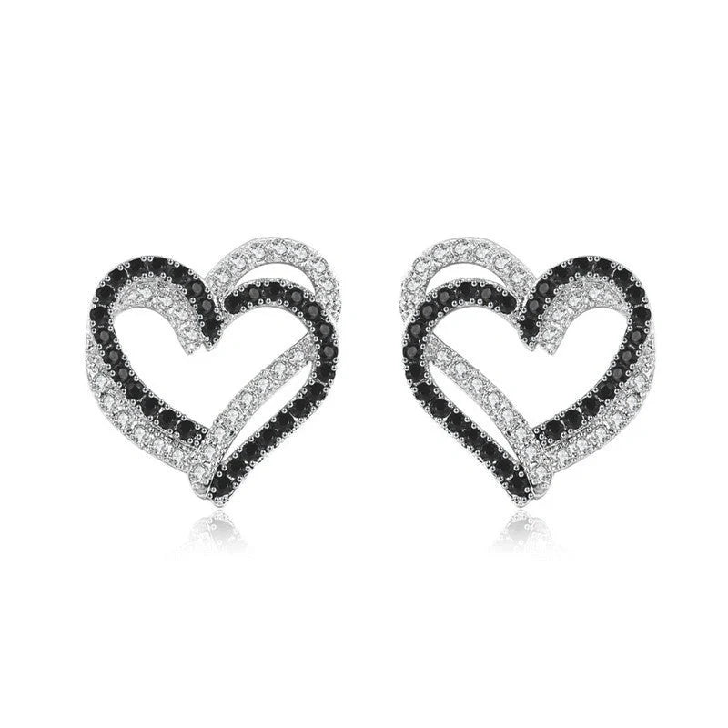 Stylish copper heart-shaped earrings with a double buckle design, perfect for adding a touch of elegance to any outfit.