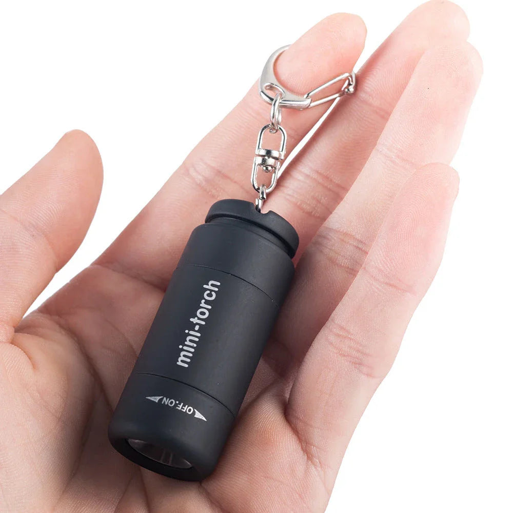 Compact USB rechargeable LED flashlight in various colors for everyday carry and outdoor use