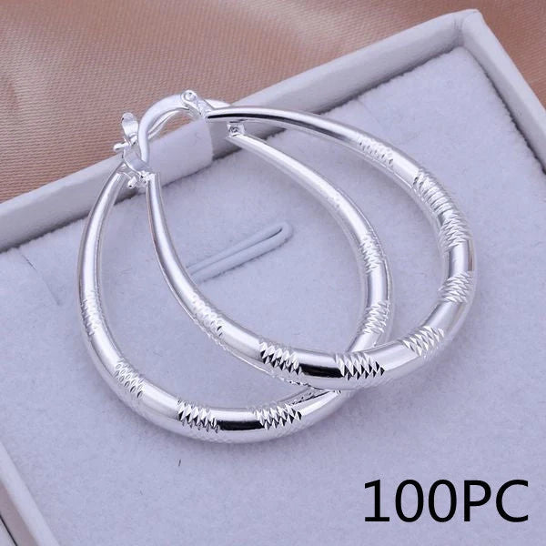 Stylish silver hoop earrings with a unique blend of European and American design, crafted from premium copper and 925 sterling silver plating