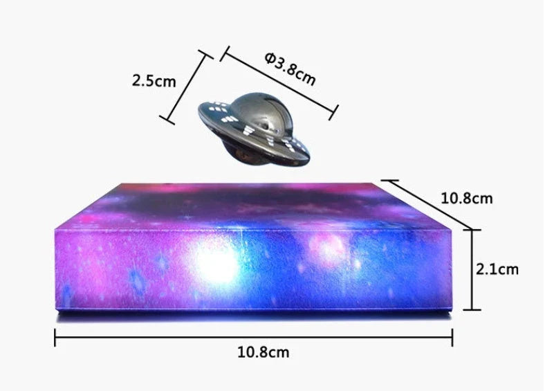 Futuristic levitating UFO lamp with color-changing lights and Milky Way galaxy base