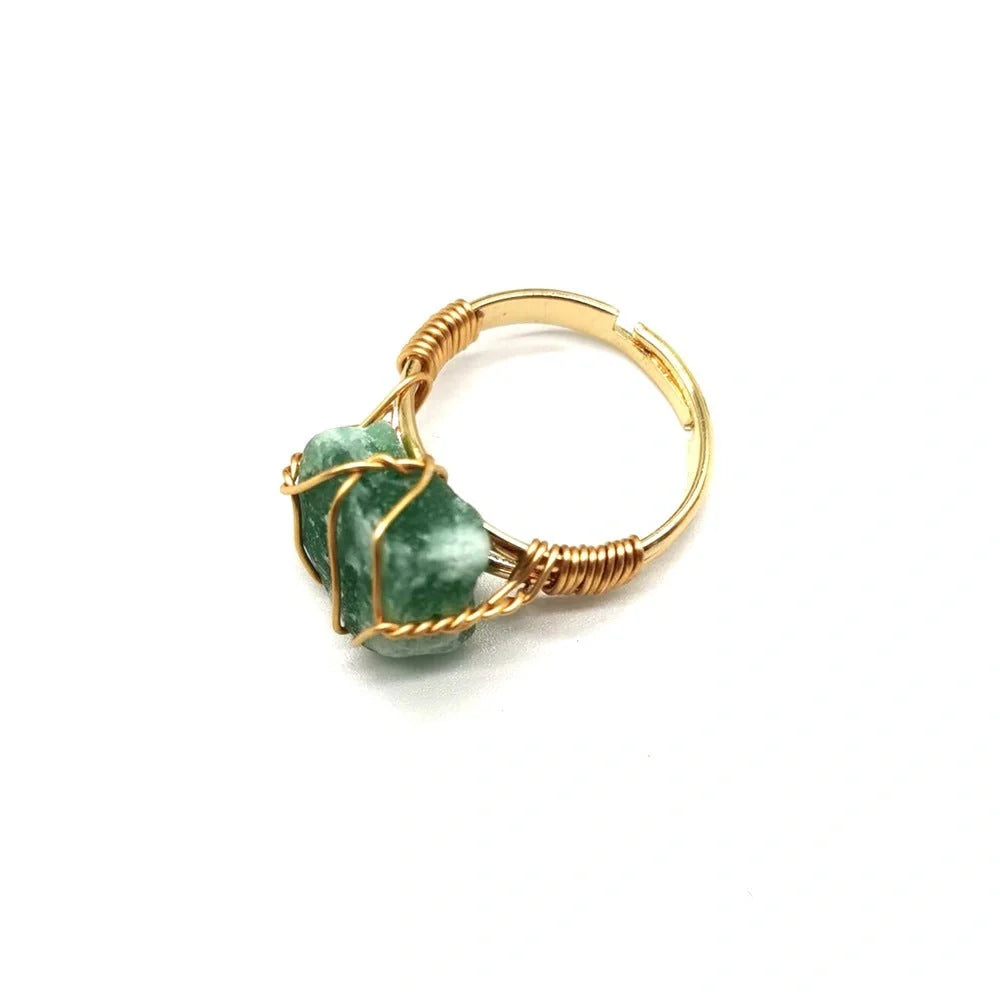 Handcrafted agate stone ring featuring an array of natural gemstones in various colours, with an adjustable design for a customized fit.