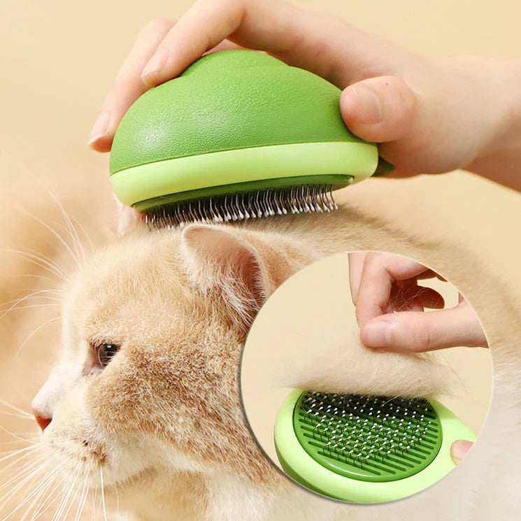 Avocado-shaped pet grooming brush with stainless steel needles for removing loose undercoat hair and providing a soothing massage