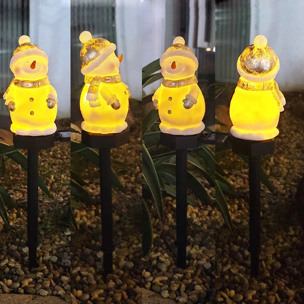 Solar-powered snowman garden light with automatic dusk-to-dawn illumination