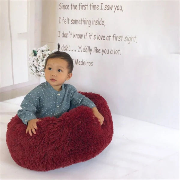 Cosy round plush cat mattress for winter warmth, available in various colours and sizes
