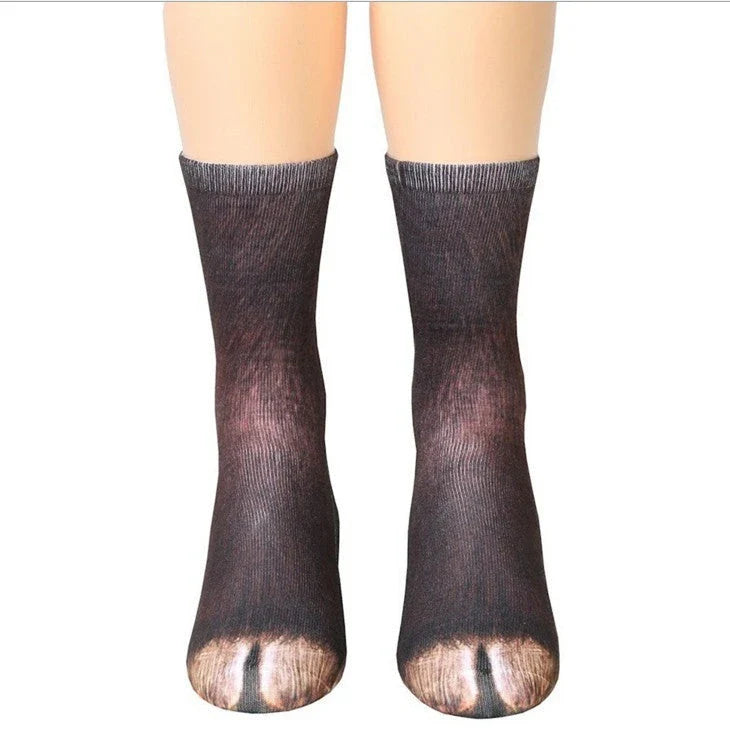 Cosy 3D animal paw socks in a variety of playful designs, including cats, dogs, elephants, tigers, and more