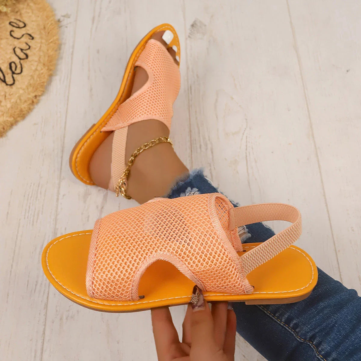 Breathable mesh sandals in various colors, featuring a lightweight design for summer comfort and style