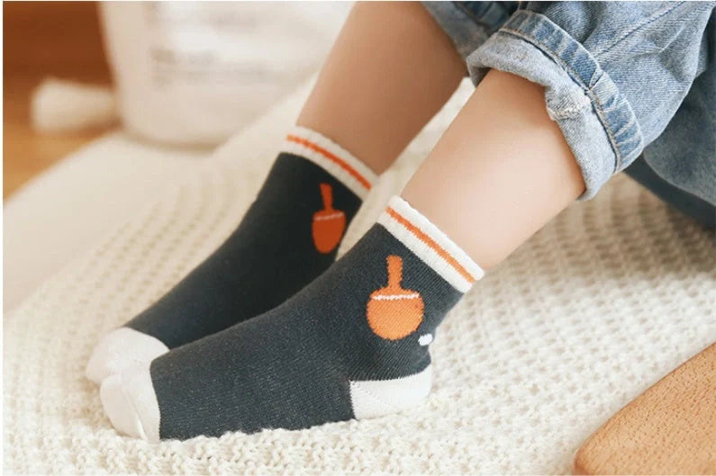Kids' cartoon jacquard cotton socks in various fun designs for comfort and style