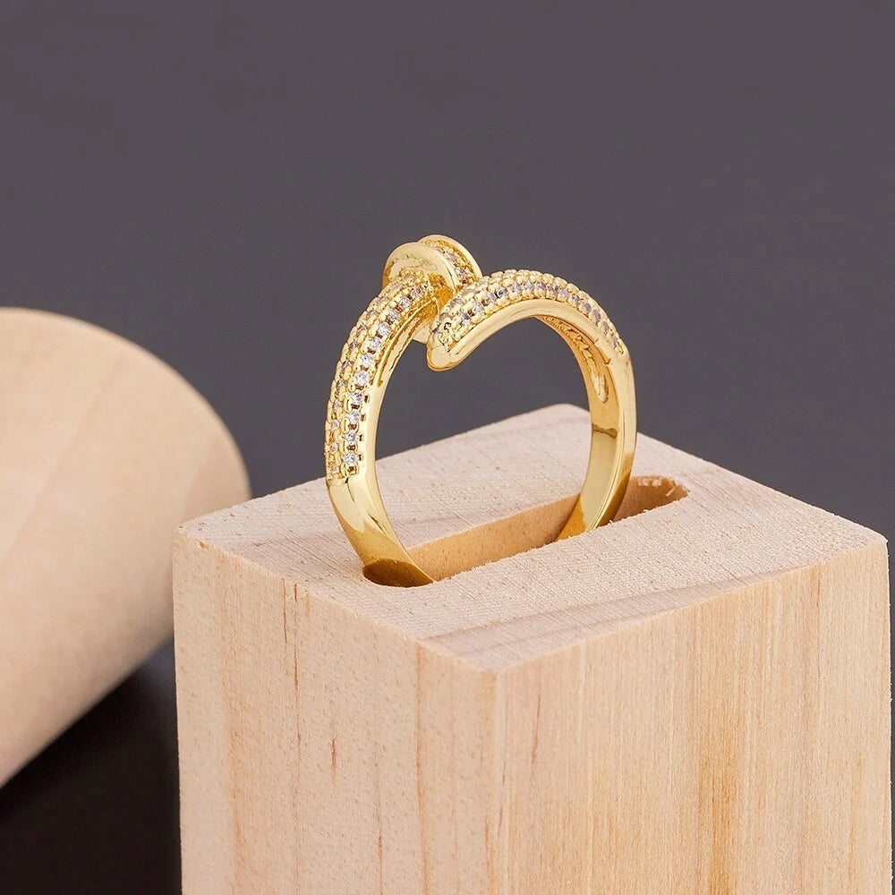 Adjustable geometric nail ring with gold-plated inlaid drill design