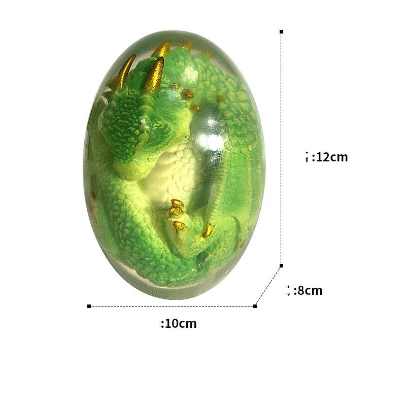 A crystal-clear resin dragon egg decor with a realistic 'lava dragon' design, perfect for fantasy and fossil enthusiasts.