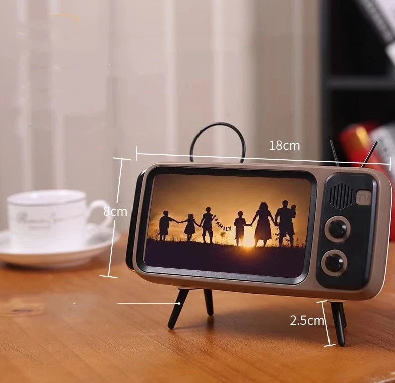 Vintage-inspired portable Bluetooth speaker with retro TV-style design and sleek, compact body