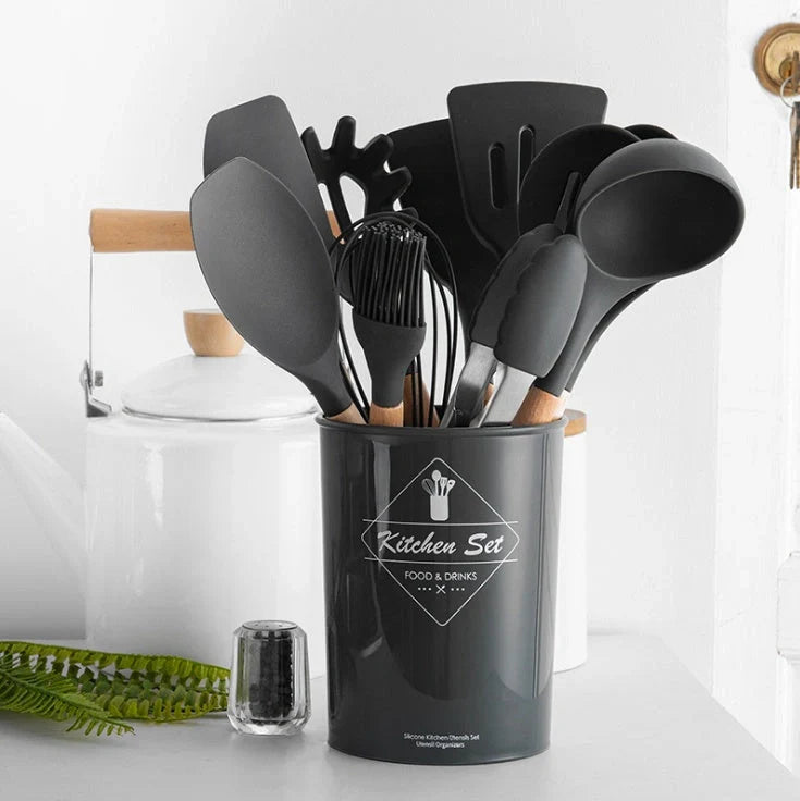 Silicone kitchenware set with wooden handles in various colors and styles, perfect for cooking, baking, and serving