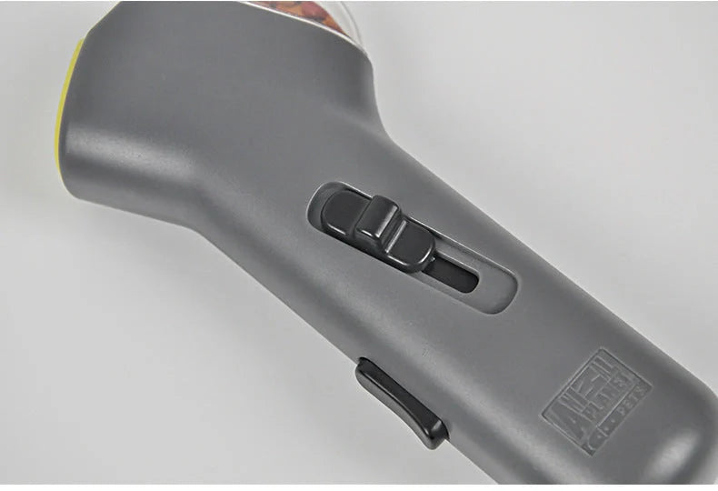 Dog Training Snack Launcher in grey, compact design for interactive pet play