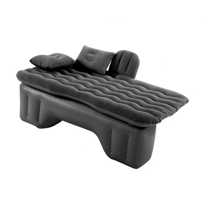 Inflatable car mattress with pillows in various colors, perfect for comfortable road trips and outdoor adventures