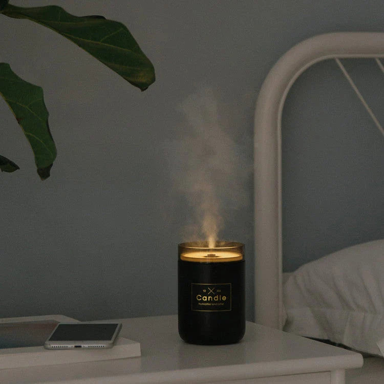 Compact USB-powered air humidifier with adjustable mood lighting, ideal for desks or bedside tables