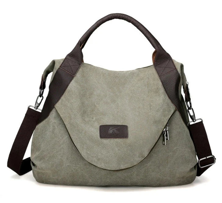 Stylish and versatile canvas shoulder bag with premium brass hardware and thoughtful interior organisation