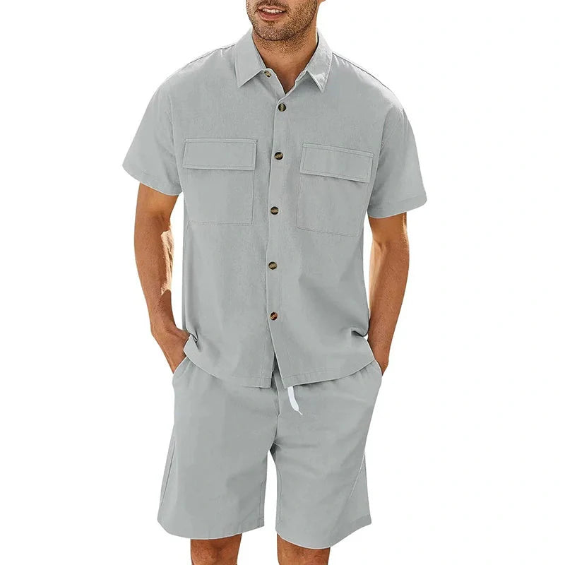 A stylish summer suit featuring a short-sleeved shirt and drawstring shorts in a variety of classic colours, perfect for leisure and sports activities.