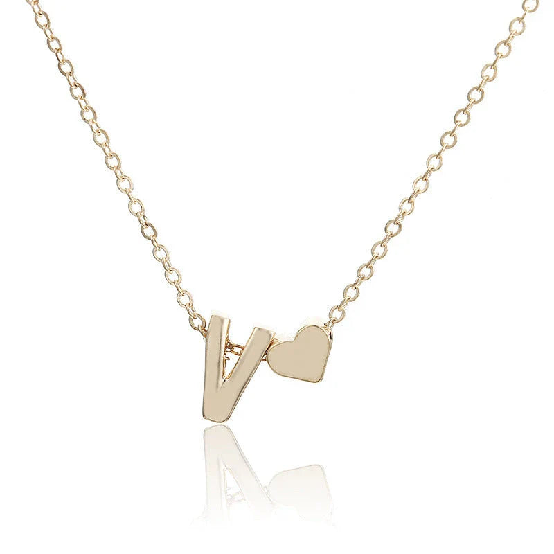 Heart-shaped pendant necklace with adjustable chain in various metallic finishes