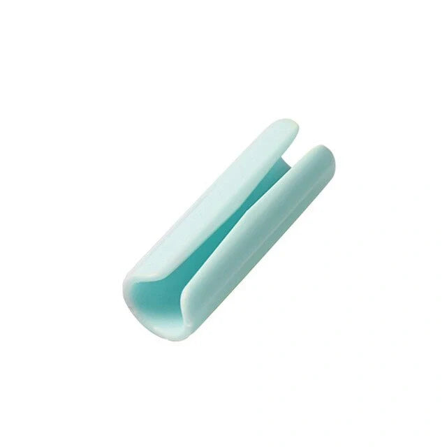 Non-slip sheet fixing clips in various colours for securing bedding and cushions