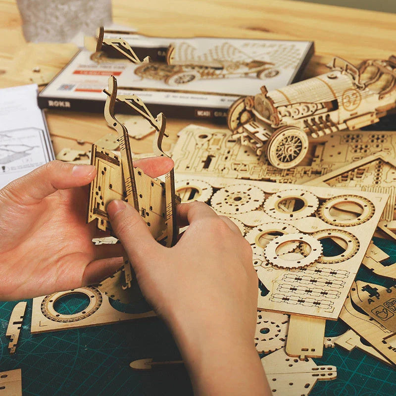 Premium wooden train model kit with detailed components and instructions for DIY assembly