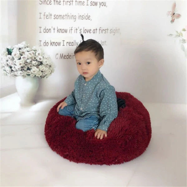 Cosy round plush cat mattress for winter warmth, available in various colours and sizes
