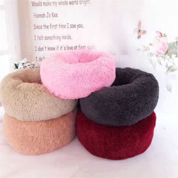Cosy round plush cat mattress for winter warmth, available in various colours and sizes