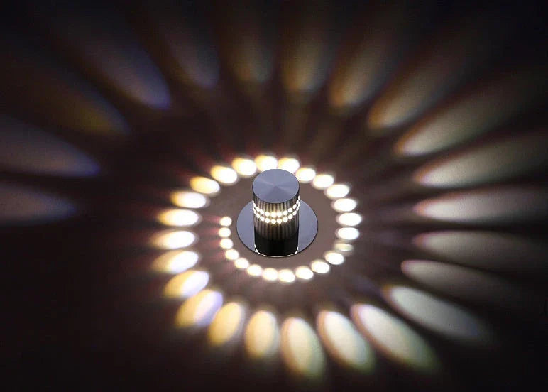 Colorful LED wall lights with a spiral design, featuring a wireless remote control for adjusting the vibrant color-changing display.