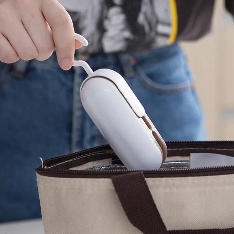 Mini Sealer Portable Heat Sealer in grey and brown for sealing snack bags and plastic packaging
