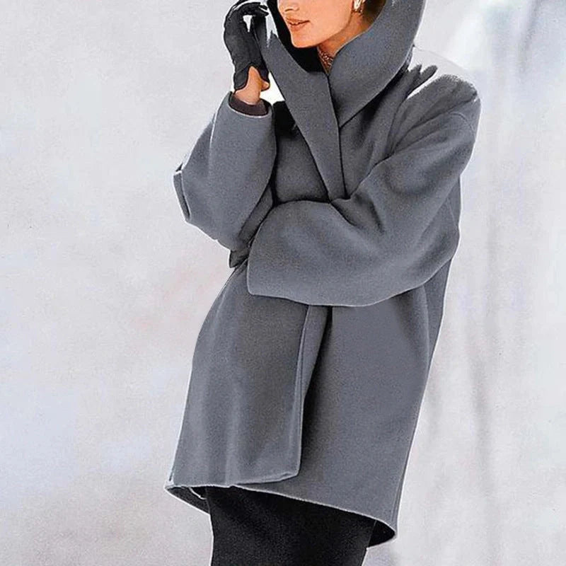 A stylish woollen coat in a variety of vibrant colours, perfect for the autumn and winter seasons.