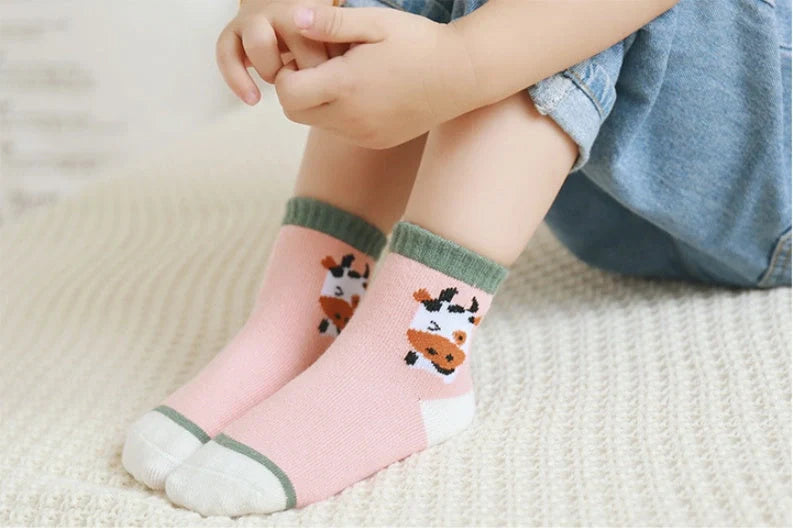 Kids' cartoon jacquard cotton socks in various fun designs for comfort and style