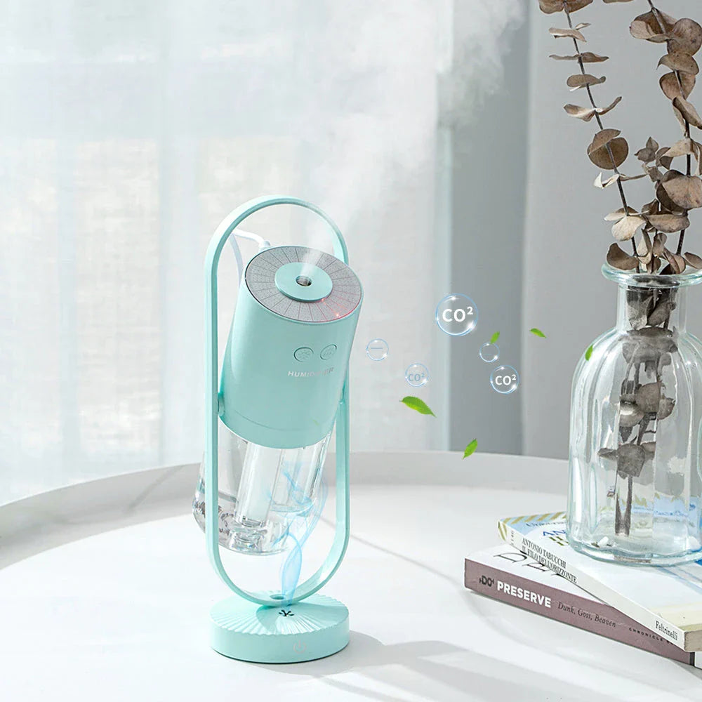 Compact USB Powered Desktop Humidifier with Ambient Lighting, featuring adjustable mist nozzle and romantic starry projection