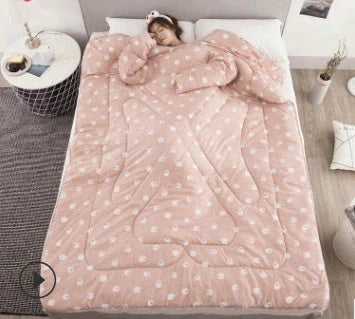Cozy quilted lounger with sleeves in various colors and sizes, perfect for year-round indoor comfort and relaxation.