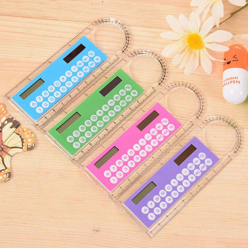 Solar-powered ultra-thin ruler calculator with magnifier function on transparent background