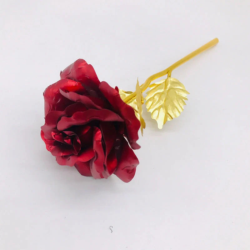 A luxurious 24K gold-plated rose flower bouquet set with a gift box and tote bag