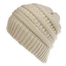 Stylish knitted wool beanie for British ladies with a discreet ponytail hole and a variety of vibrant colour options