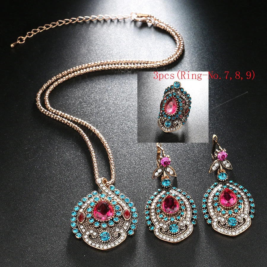 Elegant bohemian-style jewellery set featuring necklaces, earrings, and rings in a variety of colours and sizes