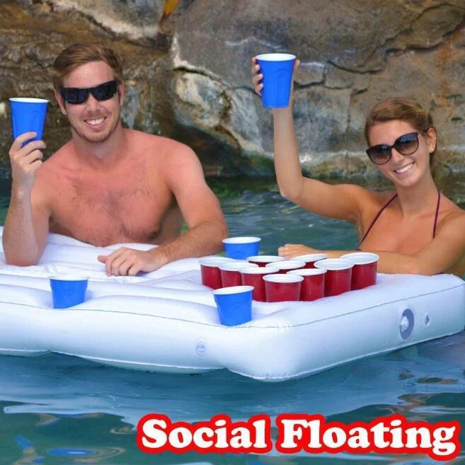 Inflatable beer pong table with built-in cooler floating in pool