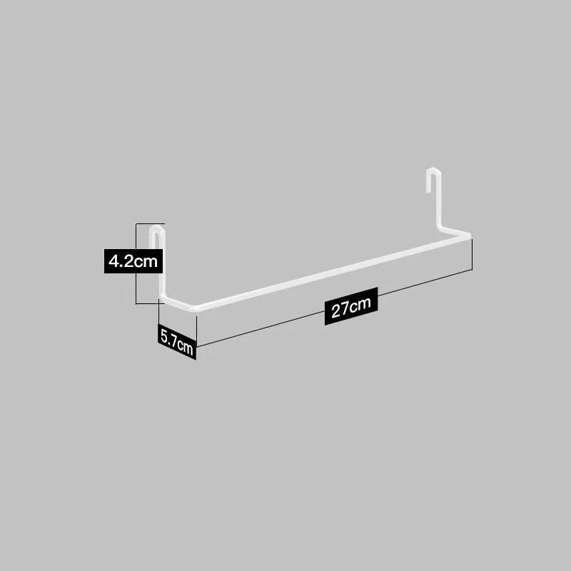A high-quality stainless steel wall-mounted kitchen storage rack with a perforated design for customisable storage