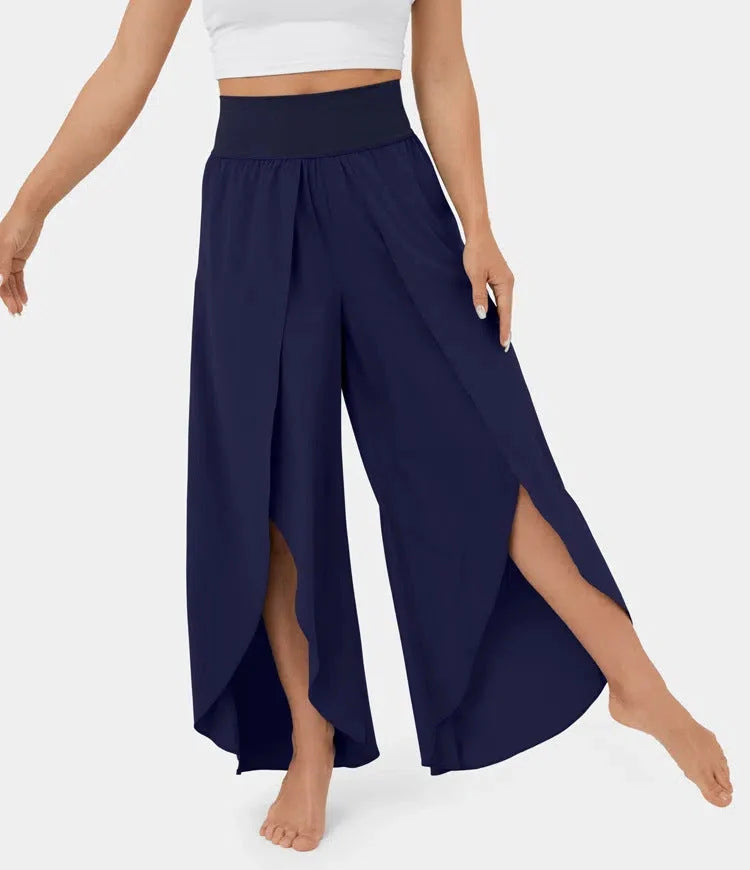 Versatile high-waist split-leg yoga trousers in a variety of colours, featuring a wide-leg silhouette and elasticated waistband for comfort and style.
