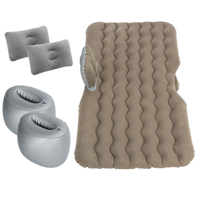 Inflatable car mattress with pillows in various colors, perfect for comfortable road trips and outdoor adventures
